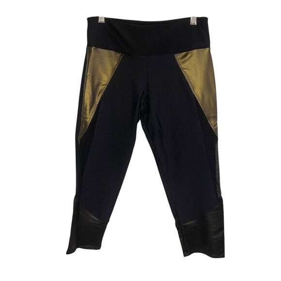 ONZIE Womens Size S/M Black & Gold Cropped Leggings with Sheer Mesh Side Inserts - Picture 1 of 8